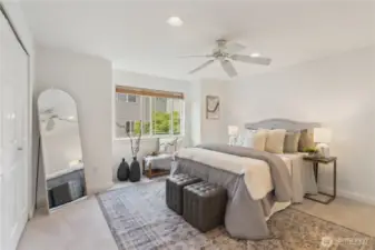 Huge primary suite large enough for king size bed. Features wlak-in closet, additional closet, bay window, en suite