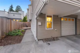 Easily park in your light garage. A rare find- additional driveway space, perfect for a 3-point turn