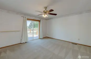 Primary Bedroom w/access to the backyard deck