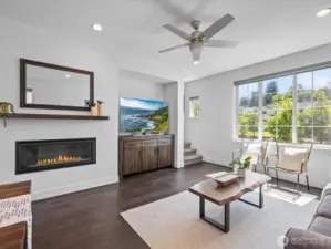 Features cozy gas fireplace, recessed nook for TV and accessories.