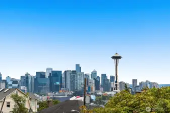 Morning coffee with the Space Needle, evening sunsets with the city lights.