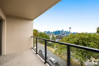An inviting balcony made for entertaining—or simply soaking in the skyline.