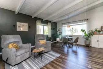 Luxury vinyl plank flooring adds warmth to the living room.