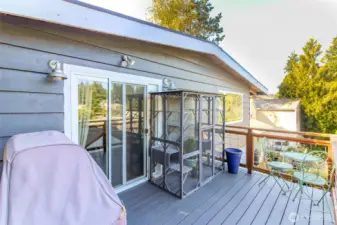 Upper deck has plenty of room for the grill and seating to enjoy the view. Even the cats love it from inside their catio.