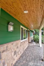 Covered front walk way from garage to front door.