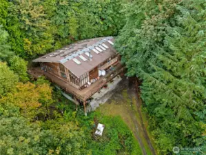 Owner built home - not up to current code. Could be a tear down. Well and septic near home