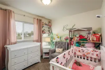 One of the two bedrooms upstairs has a painted mural that is absolutely beautiful. Very light & bright room.