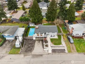 Birdseye view of your beautiful property - new roof (2021), new paint (2020), sprinkler systems front and back, new front porch and terraced steps add fabulous style - your pool was resurfaced & updated in 2019 & has new pump (2025).
