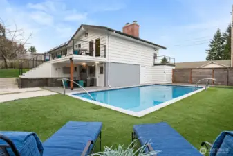 I think I mentioned a resort-like back yard, right? :) Summer will be here in a blink - think of the fun gatherings, and a perfect setup for keeping the crowd connected - covered and uncovered patios right beside the pool, huge open deck just above, and easy-care turf deck around the pool.....once again, room for that crowd of friends you have!