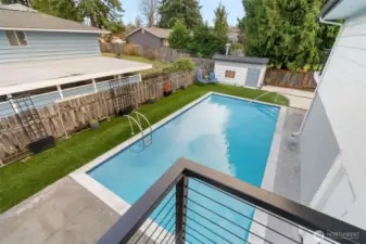Another view of your updated pool, this time from the wrap-around front porch. Note that the back yard is fully wrapped in privacy fence - what happens at the resort stays at the resort ;)