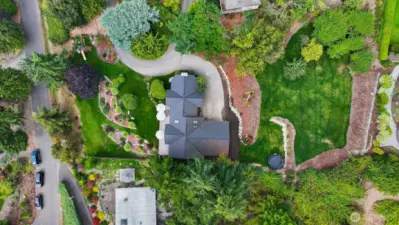 The thoughtfully designed outdoor spaces boast lush greenery and manicured gardens, creating a serene retreat perfect for relaxation or entertaining.