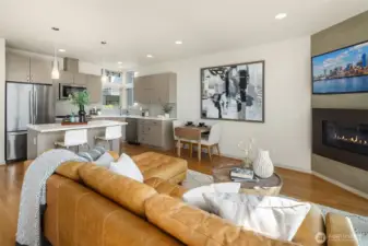 Open flow from living to dining—whether it’s popcorn on the couch or dinner around the table, this space is built for both.