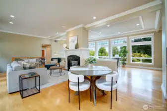 Lounge how you like against the backdrop of your second marble fireplace and backyard views. Informal dining space for quick work or casual meals.