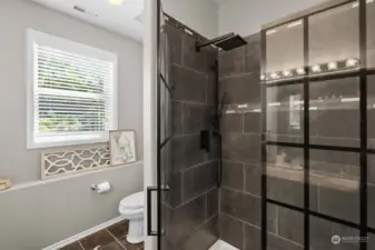 Tiled shower on lower level