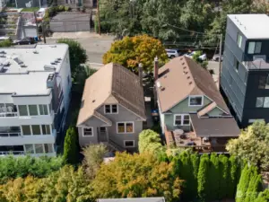 Aerial view of the back of the house (tan siding, center screen).