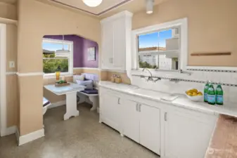 Vintage kitchen tile and cabinets, plus eating nook with built-ins.