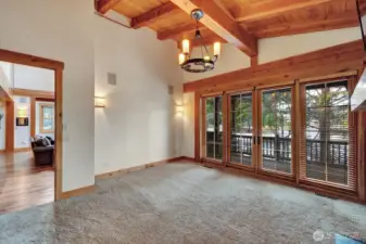 Doors exiting to deck from primary bedroom.