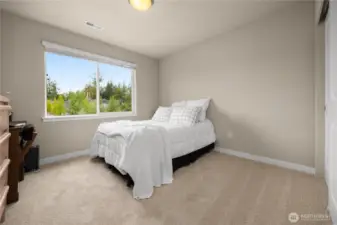 Guest bedroom #1 faces the front of the home