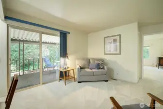 Large family room with access to back deck
