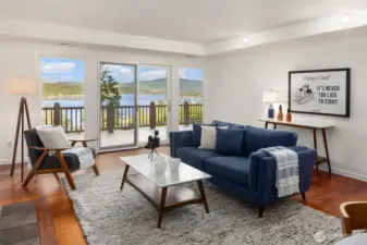 Family room on the lower level with it's own deck entrance.