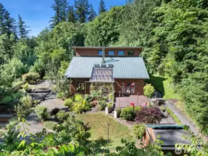 Backyard filled with paths and lush gardens