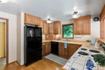 Kitchen with doorway to laundry/mud room