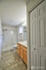 Primary bathroom with walk-in shower.