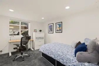 Bedroom 4 is on the lower level of the main house.