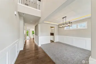 Grand entryway with open ceiling. Use room on the right for a formal dining or sitting area