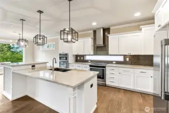 Double ovens, built-in microwave, wine storage, soft close drawers and cupboards