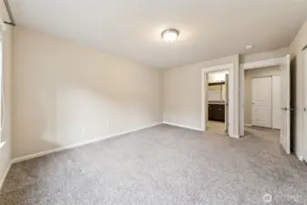 Basement bedroom showing door to the bathroom