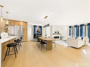 Open floor plan connecting dining room and kitchen and living room