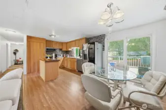Kitchen and dining area leading to the deck!
