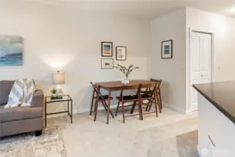 Host dinner parties and gatherings with friends - there's room for a full-size dining set here!