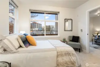 Start every day with soft morning light and birds singing outside your window - this bedroom is your ideal in-city retreat!