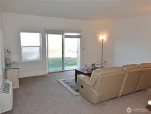 Living Room. Comes Furnished. Window heat and AC unit.