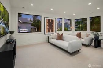 Flexible upper floor bonus space with theater room