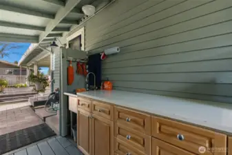 Countertops and storage for doing your flower design.  Check out the shop in the garage when you are here. Built in cabinets with stainless steel countertops stay.  Seller is willing to negotiate the contents with the woodworker-carpenter in your home if you would like.