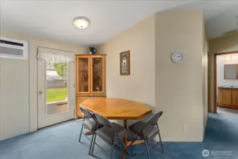 Cozy dining nook with a door to the outdoor patio