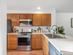 Kitchen with updated large Kholer stainless steel sink + faucet