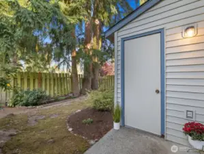 Locking storage shed off of patio