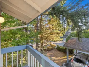 Private east-facing balcony off of second bedroom streams morning sun