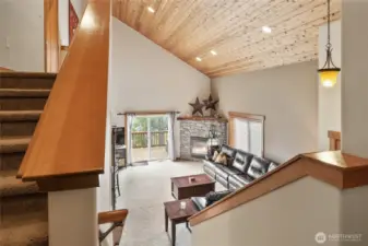 Stairs lead to the upper level, home to the primary suite.