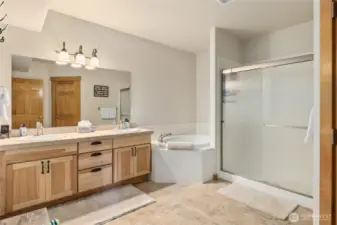 Large shared bath with jetted tub.