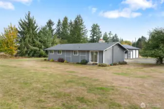 Big backyard with open views of the surrounding countryside.