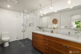 Primary five piece bathroom with heated floors.