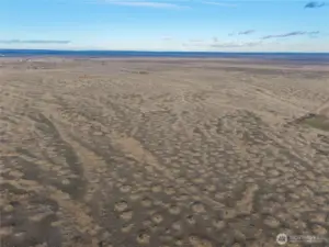 Photo is from the southwest boundary looking northeast. Access is from Road 11 at the corner of the green area, towards Road A.