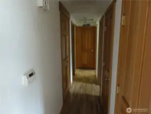 Hallway to bedrooms and laundry.