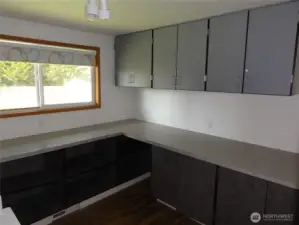 Fourth bedroom converted to laundry area. Check out the cabinets for crafts!