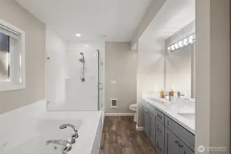 Freshly renovated Primary Bathroom with soaking tub and shower